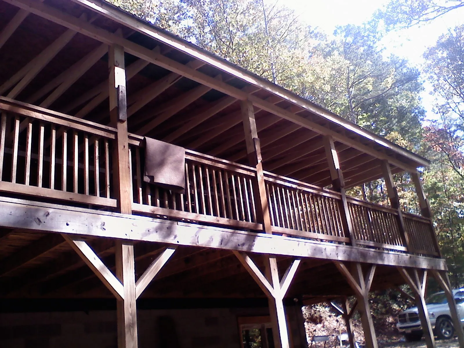 Timber framing under a new elevated porch and deck — Roof Leak Repair in Mc Dade by Roofing Brothers